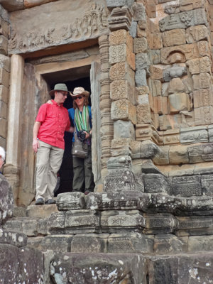 Fran and Alan at the tower of the 9th century c.e. Bakong Temple - in the Roluos Group, Cambodia