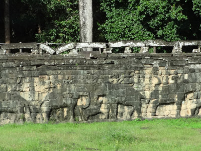The Terrace of Elephants' retaining wall in Angkor Thom showing elephants & riders (mahouts) - Siem Reap Province, Cambodia 