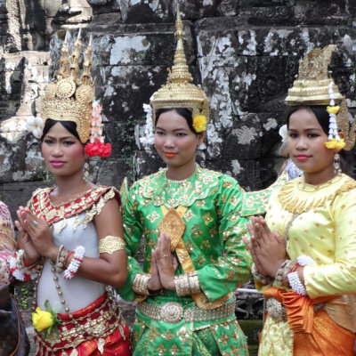 Tourists can pay to have their photo taken with these women dressed in attractive Cambodian outfits - Angkor Thom, Cambodia