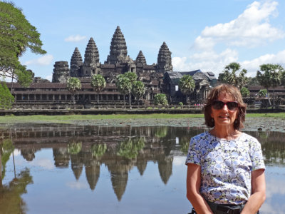 Judy near a reflecting pool on the grounds of Angkor Wat - Angkor, Siem Reap Province, Cambodia