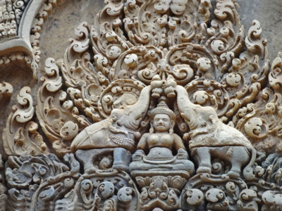 Bas relief: Lakshmi, Hindu goddess of wealth is sprinkled with holy water by two elephants - Banteay Srei Temple, Cambodia 