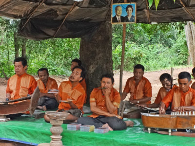 Men playing music for donations - near the temple grounds of  Banteay Srei, Angkor, Siem Reap Province, Cambodia