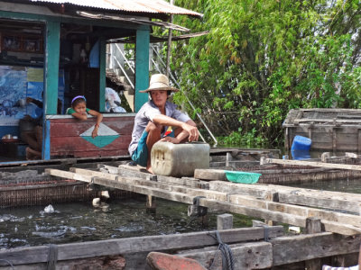 A fish farm at a floating house in the floating village of Tonle Sap Lake, Siem Reap Province, Cambodia