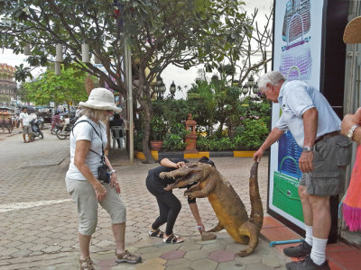 Helen was startled when a crocodile snared her clothing. Stan rescued her by holding the croc's tail - Siem Reap, Cambodia