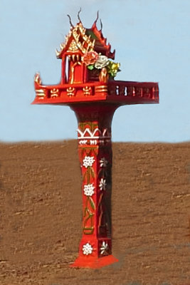 A shrine like this one was seen next to many homes and businesses - near Siem Reap, Cambodia