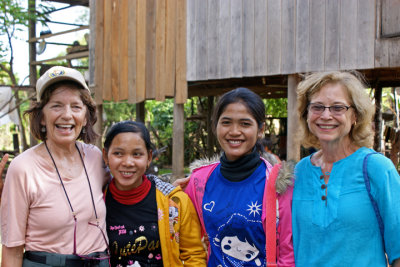 Judy and Stacy with two of our sponsored young ladies (high school students) - rural village