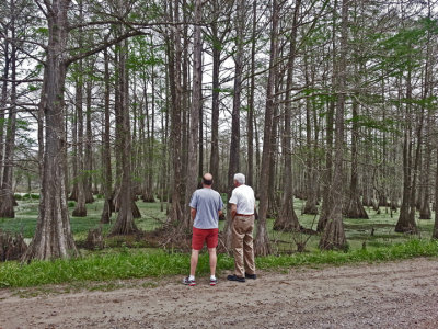 Ken and Jerry on a dirt back road next to a swamp in southwedstern Louisiana - when you gotta you gotta :-)