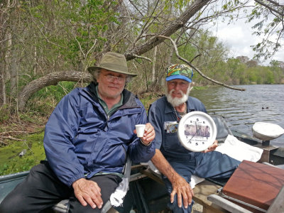 Norbert and Richard on Lake Martin. Norbert's clock shows only the number five meaning it's time to imbibe anytime.