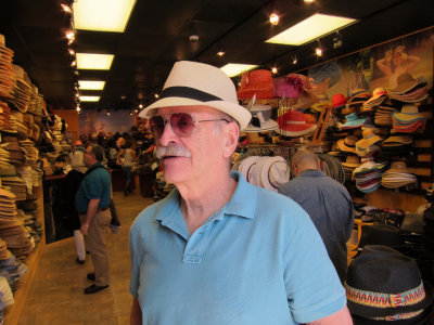 Ken definitely looking svelte while trying on a hat in a hat store in the French Quarter of New Orleans