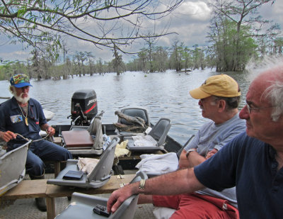 Norbert our guide, Ken and Elliott on Lake Martin. Norbert has been hunting alligators for decades - gator head is in the boat.