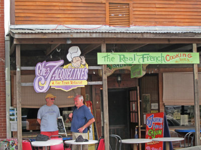 Ken and Elliott in front of Chez Jacqueline's (French and Cajun cuisine) in downtown Breaux Bridge in southwestern Louisiana