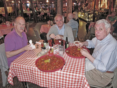 Elliott and Jerry eating crawfish (Ken is to the left) at Pont Breaux's Cajun Restaurant in Breaux Bridge