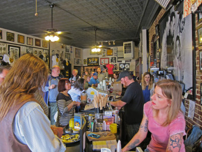 Cora our Sun Studio tour guide was behind the counter - Elliott & Ken in the background - main room at Sun Studio in Memphis