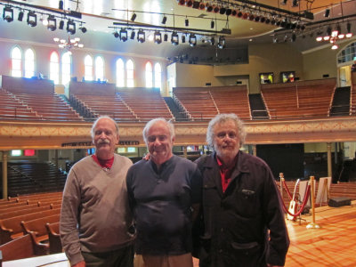 Elliott, Ken and Richard on the stage of the Ryman Auditorium in downtown Nashville, Tennessee