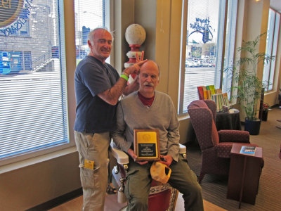 Elliott graciously provides Ken with a superb figurative haircut - at the Barbershop Harmony Society headquarters in Nashville 