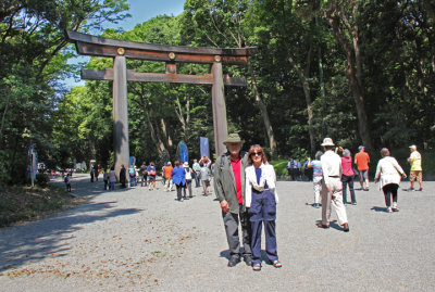 Judy and Richard at the majestic torii located along the forested approach to  the Meiji Shrine complex - Tokyo