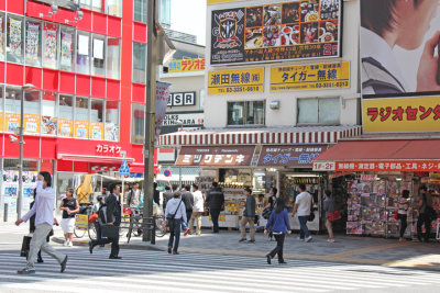 Street corner in Akihabara (Electric Town) - district in central Tokyo famous for its electronic, manga and anime shops