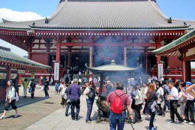 Judy next to the incense burner in front of the Main Hall of the Senso-ji Temple - Tokyo