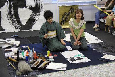 Judy receiving a lesson in calligraphy from Masunaga Koshun in her Tokyo studio 