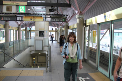 Judy at the Shiodome Station - waiting for the Yurikamome Line train to take us close to the Sumida River for a water bus ride