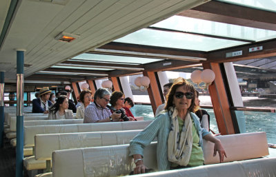 Judy on a water bus on the Sumida River