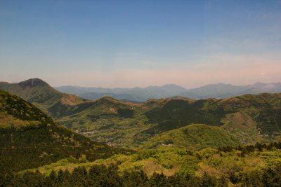  View of the surrounding mountainous area from a cable car on the Hakone Ropeway going to Owakudani