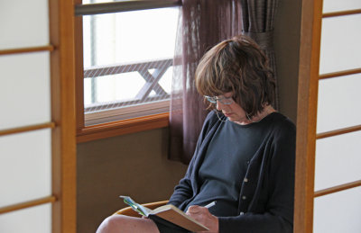 Judy in our hotel room writing notes about our trip - at the Nunohan Hotel in Suwa-shi