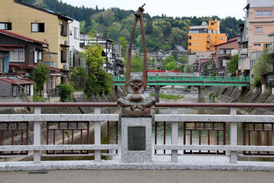 Tenaga zuchi zou - statue on the Kajibashi Bridge over the Miyagawa River in Takayama
