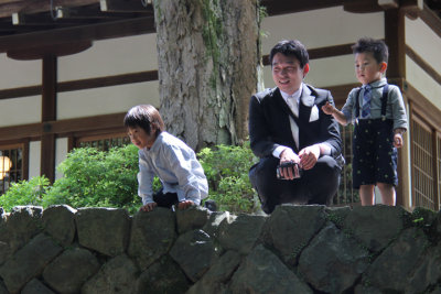 Father and two sons going to an Omiyamairi (newborn celebration) which we witnessed but were not allowed to photograph