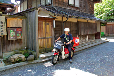 A postal carrier in Naga-machi Samurai District in Kanazawa