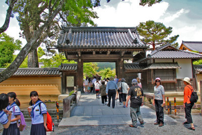 Judy, John (left of Judy), Sallie (right of Judy) & schoolgirls (left side) at the entrance gate to the Golden Pavilion in Kyoto