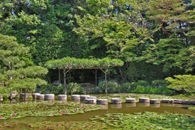 Stepping-stone path (Garyu-kyo  - lying dragon bridge) in a pond at the Heian-jingu Shrine in Kyoto