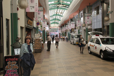 Judy in the Teramachi Shopping Arcade before the stores opened - some of the stores were being resupplied - in downtown Kyoto