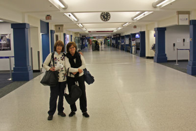Judy and Sharon arriving at Cleveland Hopkins Airport around 12:00 a.m. 