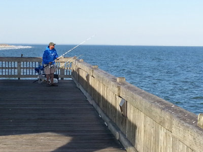 Fisherman on the fishing pier - East Coast of Tybee Island