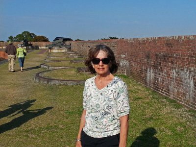 Judy on the upper perimeter with canons in the background - at Fort Pulaski on Cockspur Island