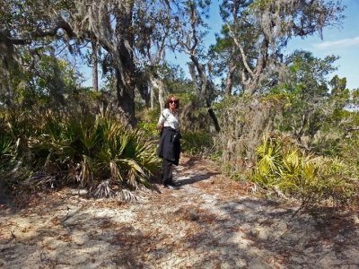 Judy on a trail to a sea water marsh - part of our private, guided tour of the marsh - Tybee Island