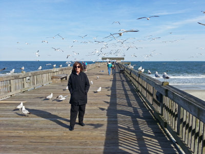 Judy and seagulls on the fishing pier - East Coast of Tybee Island
