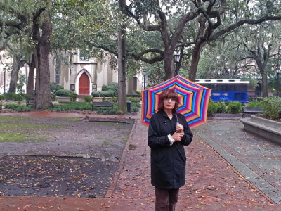 Judy on Madison Square in Savannah, Georgia. St. Johns Episcopal Church (built in the 1850's) is in the background.