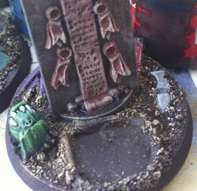 7-1 objective counter with ork head and eldar shoulder pad.jpg
