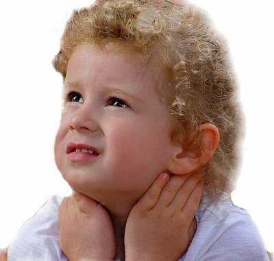 Child watching Punch and Judy Show 2013 Heacham Norfolk