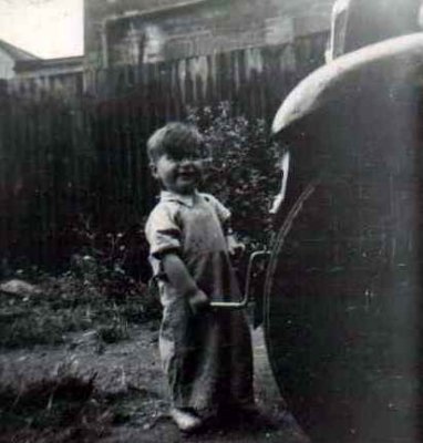 Me attempting to start a car. Possibly 1951