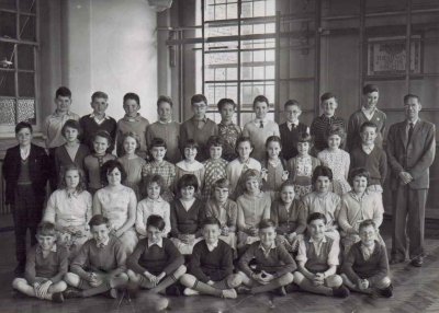 Mayville Primary 1961. I'm middle of the front row. At least I had learnt to look at the camera