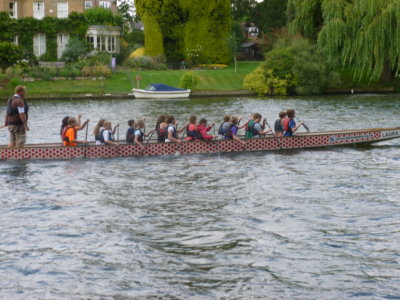 Children rowing along Kingston Riverside