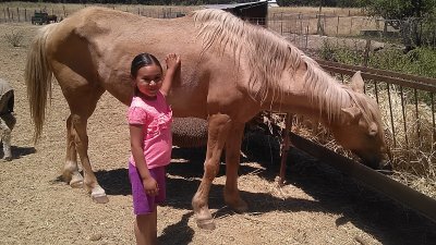 Maggie with horse 6-26-2015.jpg
