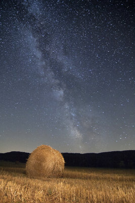straw bale under the Milky Way