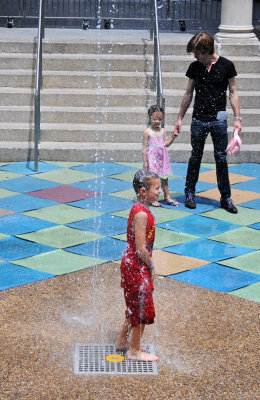 Cooling Off at the Playground Sprinkler