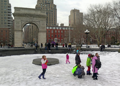 Children Playing in the Snow at the Fountain