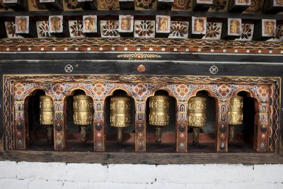 Prayer wheels at Tashichho Dzong