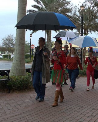 Performers on a rainy day